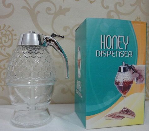 honey jar with a lid with a metal dispencer for honey