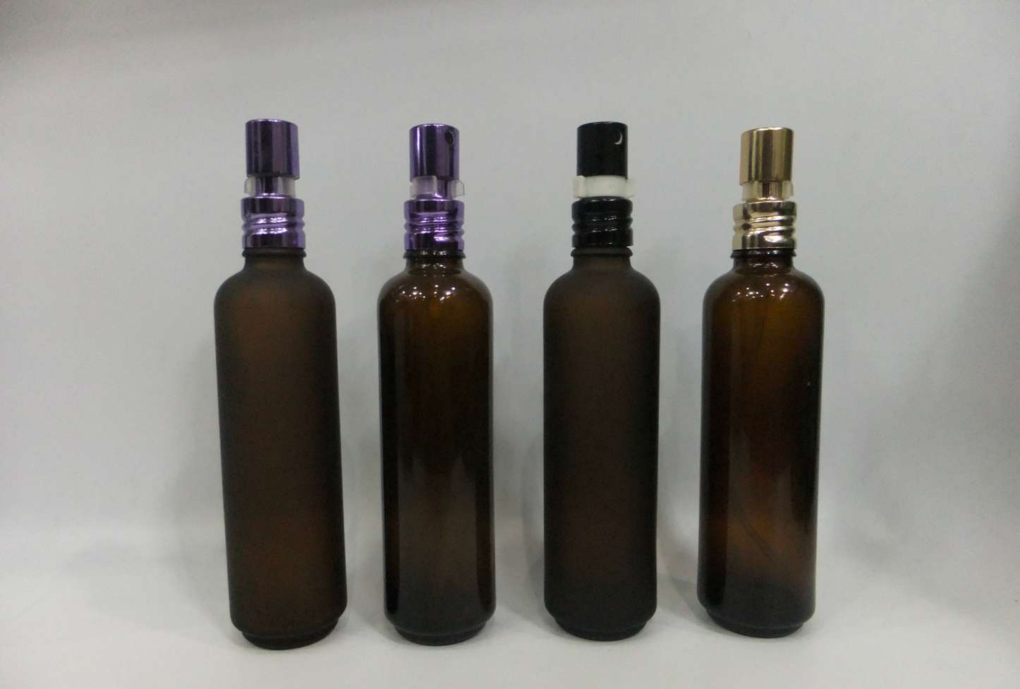 75ml amber thin and tall glass sprayer cosmetic bottle