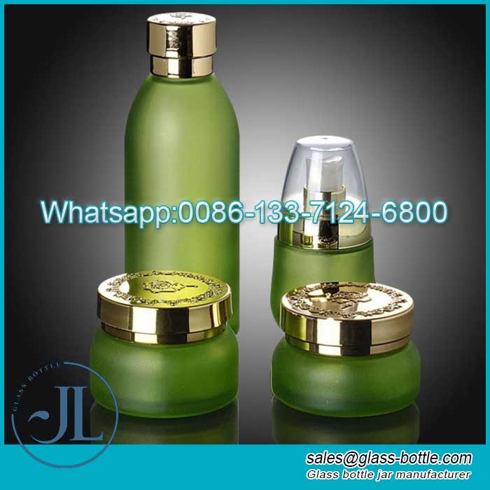 Luxury green cosmetic glass bottle with golden pump in assorted styles