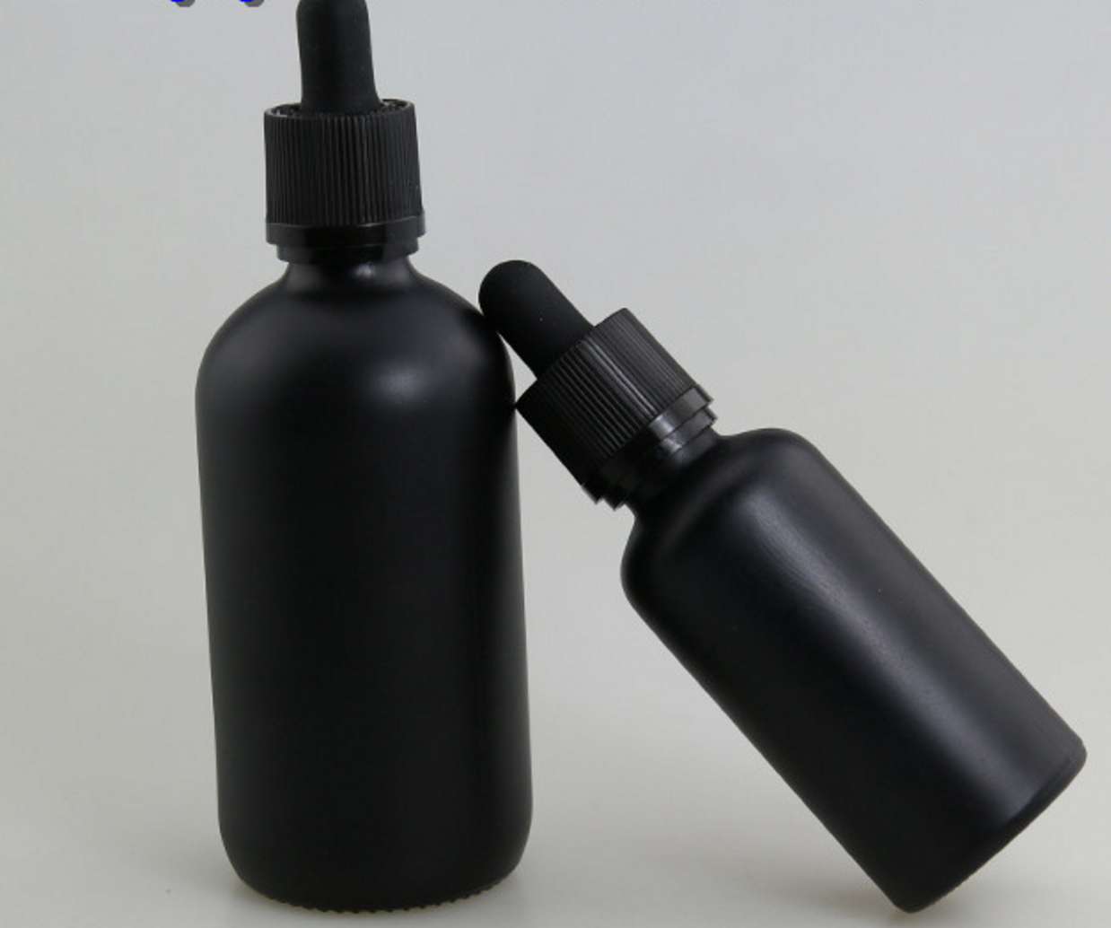 100ml facial oil black glass bottles with black droppers