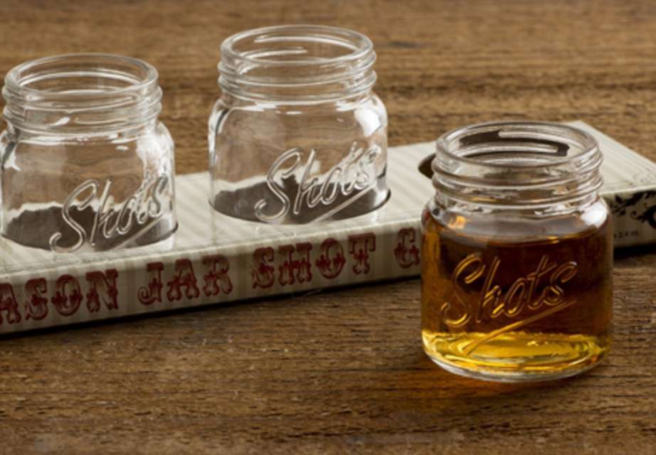 Small glass vintage mason shot glass jar