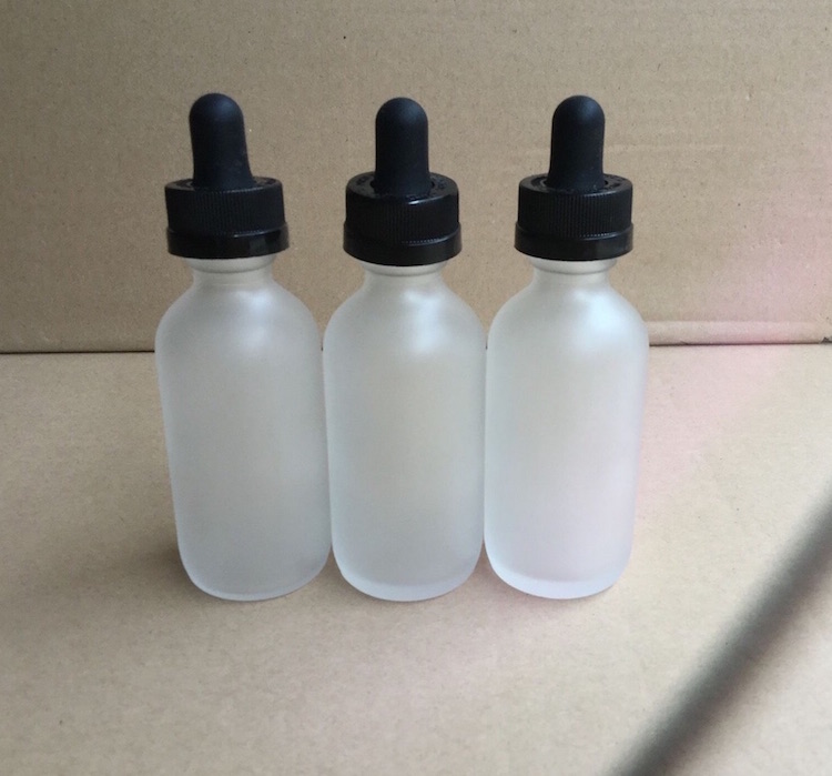 Hot sale 50ml frosted clear glass essential oil bottle