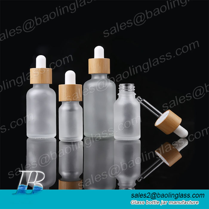 10ml 15ml 30ml 50ml 100ml amber blue green frosted dropper bottle 30 ml clear glass bottle with bamboo dropper caps