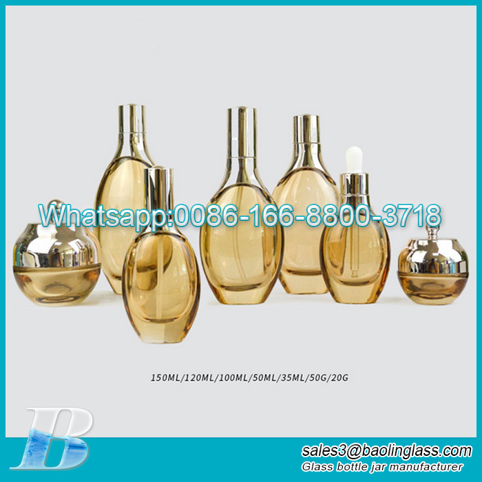 Wholesale Yellow Gold Lid Glass Serum Lotion Pump Bottle 35ml 100ml 120ml Glass Cosmetic Packaging set