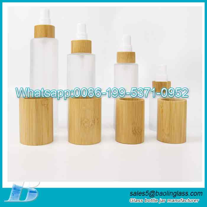 Custom 80ml 100ml lotion pump bottle with bamboo lid supplier