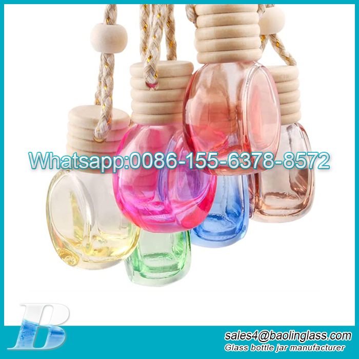 Colorful car perfume bottle handing with wooden cap