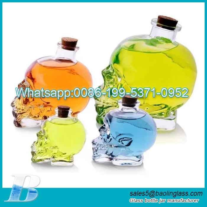Custom glass skull bottle wholesale
