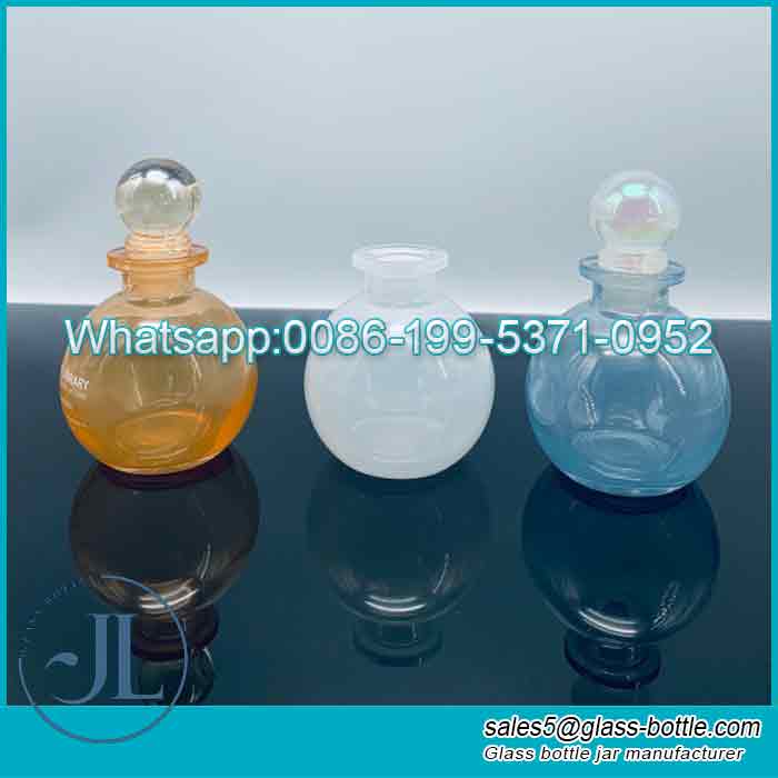 Customized 100ml transparent bayonet round ball with lid for home use aromatherapy bottle