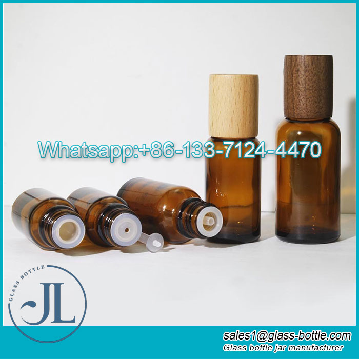 amber glass eaaential oil bottle with wooden cap